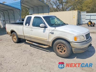 Czwarte zdjęcie samochodu z boku: 2001 FORD F150 VIN:2FTRX17L71CA11449 - miniatura