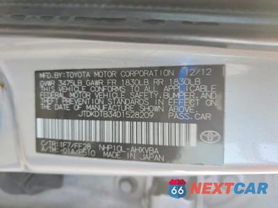 Zdjęcie 13 z 13 samochodu: 2013 TOYOTA PRIUS C TWO VIN:JTDKDTB34D1528209 - miniatura