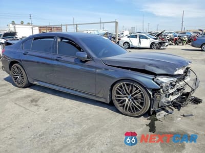 Czwarte zdjęcie samochodu z boku: 2019 BMW 750 I VIN:WBA7F0C5XKGM25835 - miniatura