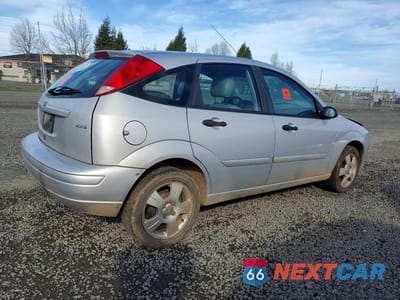 Trzecie zdjęcie samochodu z tyłu: 2005 FORD FOCUS ZX5 VIN:3FAFP37NX5R150378 - miniatura