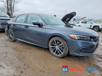 Czwarte zdjęcie samochodu z boku: 2024 HONDA CIVIC TOURING VIN:2HGFE1F95RH328127 - miniatura