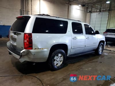 Trzecie zdjęcie samochodu z tyłu: 2011 CHEVROLET SUBURBAN K1500 LT VIN:1GNSKJE3XBR309170 - miniatura