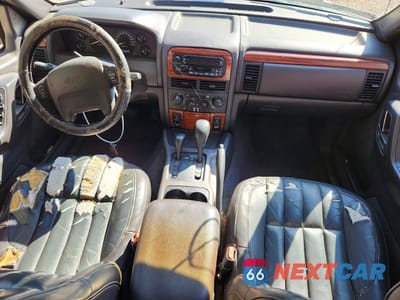 Zdjęcie 8 z 13 samochodu: 1999 JEEP GRAND CHEROKEE LIMITED VIN:1J4GW68NXXC624620 - miniatura