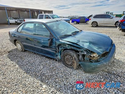 Czwarte zdjęcie samochodu z boku: 1997 SUBARU LEGACY L VIN:4S3BD4352V7206219 - miniatura