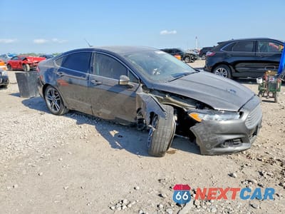 Czwarte zdjęcie samochodu z boku: 2015 FORD FUSION TITANIUM VIN:3FA6P0K95FR252701 - miniatura