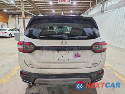 Zdjęcie 6 z 13 samochodu: 2025 HONDA PILOT TOURING VIN:5FNYG1H71SB136700 - miniatura