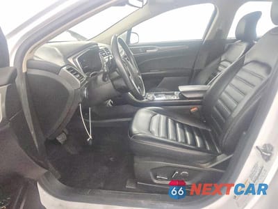 Zdjęcie 7 z 11 samochodu: 2019 FORD FUSION SEL VIN:3FA6P0CDXKR110163 - miniatura