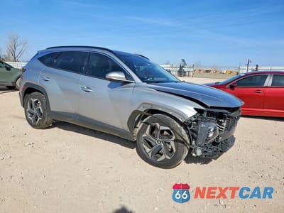 Czwarte zdjęcie samochodu z boku: 2023 HYUNDAI TUCSON LIMITED VIN:5NMJE3AE0PH220430 - miniatura