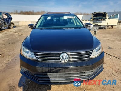 Piąte zdjęcie samochodu w środku: 2017 VOLKSWAGEN JETTA SE VIN:3VWB67AJXHM246616 - miniatura