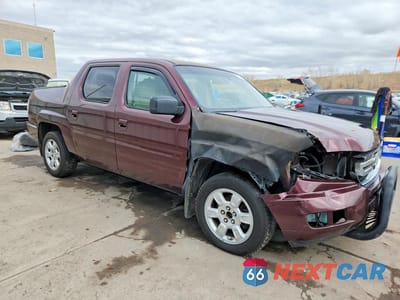 Czwarte zdjęcie samochodu z boku: 2010 HONDA RIDGELINE RTL VIN:5FPYK1F53AB012630 - miniatura