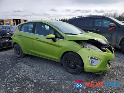 Czwarte zdjęcie samochodu z boku: 2011 FORD FIESTA SES VIN:3FADP4FJ3BM168404 - miniatura