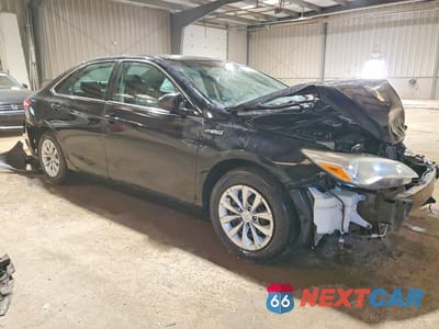 Czwarte zdjęcie samochodu z boku: 2016 TOYOTA CAMRY HYBRID LE VIN:4T1BD1FKXGU183563 - miniatura