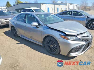 Czwarte zdjęcie samochodu z boku: 2024 TOYOTA CAMRY HYBRID XSE VIN:4T1K31AK8RU070949 - miniatura