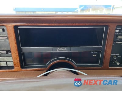 Zdjęcie 9 z 12 samochodu: 1991 CADILLAC ELDORADO VIN:1G6EL13B1MU613858 - miniatura