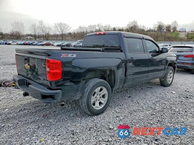 Trzecie zdjęcie samochodu z tyłu: 2016 CHEVROLET SILVERADO K1500 LT VIN:3GCUKREC3GG213128 - miniatura