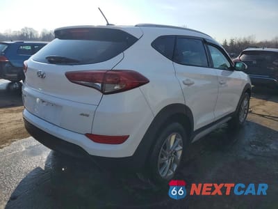 Trzecie zdjęcie samochodu z tyłu: 2017 HYUNDAI TUCSON SE VIN:KM8J3CA46HU403981 - miniatura