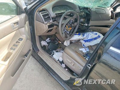 Zdjęcie 8 z 11 samochodu: 2004 TOYOTA CAMRY LE VIN:4T1BE30KX4U351392 - miniatura