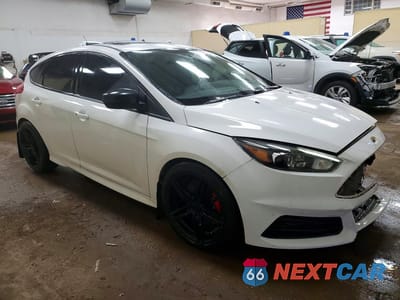 Czwarte zdjęcie samochodu z boku: 2017 FORD FOCUS ST VIN:1FADP3L99HL204479 - miniatura