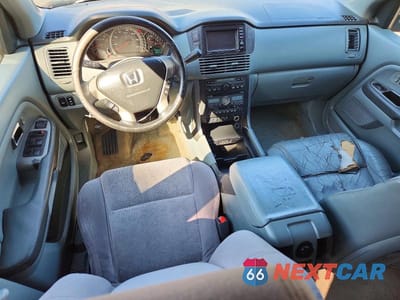 Zdjęcie 8 z 14 samochodu: 2004 HONDA PILOT EXL VIN:2HKYF18764H609224 - miniatura