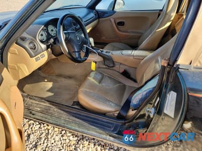 Zdjęcie 7 z 11 samochodu: 1999 MAZDA MX-5 MIATA VIN:JM1NB3534X0119653 - miniatura