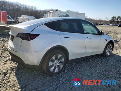 Trzecie zdjęcie samochodu z tyłu: 2023 TESLA MODEL Y VIN:7SAYGDEE8PA173058 - miniatura