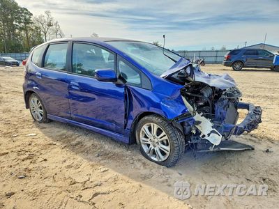 Czwarte zdjęcie samochodu z boku: 2010 HONDA FIT SPORT VIN:JHMGE8H43AS011200 - miniatura
