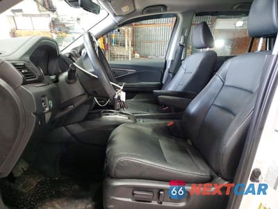 Zdjęcie 7 z 13 samochodu: 2022 HONDA PILOT SE VIN:5FNYF6H27NB083476 - miniatura