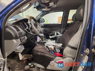 Zdjęcie 7 z 11 samochodu: 2015 TOYOTA TACOMA V6 VIN:3TMLU4EN0FM189946 - miniatura