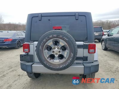 Zdjęcie 6 z 11 samochodu: 2017 JEEP WRANGLER UNLIMITED SAHARA VIN:1C4BJWEG3HL747651 - miniatura