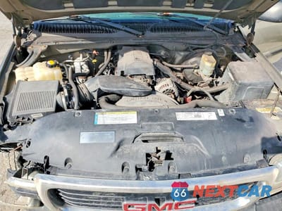 Zdjęcie 11 z 11 samochodu: 2000 GMC NEW SIERRA C1500 VIN:1GTEC14V1YE399413 - miniatura