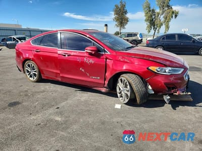 Czwarte zdjęcie samochodu z boku: 2019 FORD FUSION TITANIUM VIN:3FA6P0RU6KR148786 - miniatura
