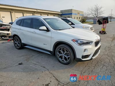 Czwarte zdjęcie samochodu z boku: 2016 BMW X1 XDRIVE28I VIN:WBXHT3C3XGP880789 - miniatura