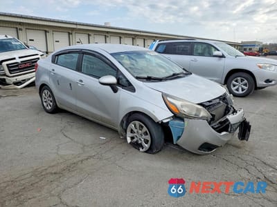 Czwarte zdjęcie samochodu z boku: 2013 KIA RIO LX VIN:KNADM4A31D6107077 - miniatura