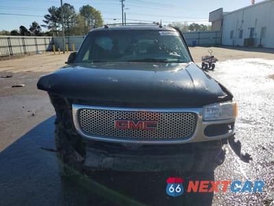 Piąte zdjęcie samochodu w środku: 2003 GMC YUKON DENALI VIN:1GKEK63U93J289318 - miniatura