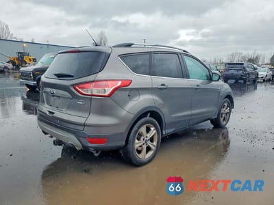 Trzecie zdjęcie samochodu z tyłu: 2014 FORD ESCAPE SE VIN:1FMCU9GXXEUB32493 - miniatura
