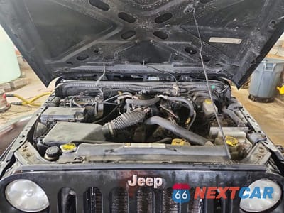 Zdjęcie 11 z 13 samochodu: 2009 JEEP WRANGLER UNLIMITED SAHARA VIN:1J4GA59149L749734 - miniatura