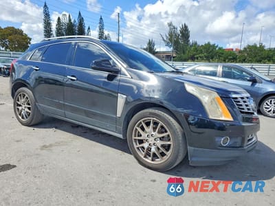 Czwarte zdjęcie samochodu z boku: 2013 CADILLAC SRX PERFORMANCE COLLECTION VIN:3GYFNDE37DS648062 - miniatura