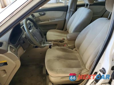 Zdjęcie 7 z 11 samochodu: 2006 KIA OPTIMA VIN:KNAGE123565063357 - miniatura