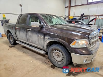 Czwarte zdjęcie samochodu z boku: 2016 RAM TRUCKS 1500 LARAMIE VIN:1C6RR7NT7GS320737 - miniatura