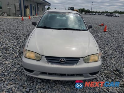 Piąte zdjęcie samochodu w środku: 2002 TOYOTA COROLLA CE VIN:1NXBR12E22Z610003 - miniatura