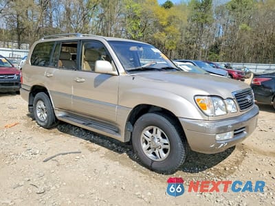 Czwarte zdjęcie samochodu z boku: 2001 LEXUS LX 470 BASE VIN:JTJHT00W213501936 - miniatura