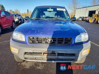 Piąte zdjęcie samochodu w środku: 1999 TOYOTA RAV4 BASE VIN:JT3HP10V1X7128527 - miniatura
