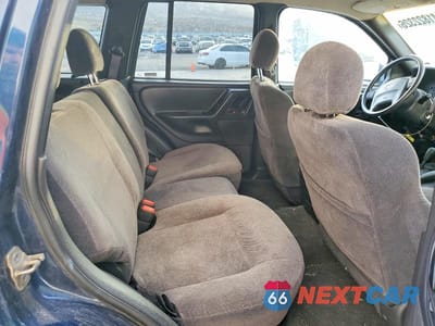 Zdjęcie 10 z 11 samochodu: 2001 JEEP GRAND CHEROKEE LAREDO VIN:1J4GW48S61C590371 - miniatura