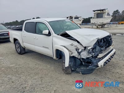 Czwarte zdjęcie samochodu z boku: 2017 TOYOTA TACOMA SR5 V6 VIN:3TMAZ5CN7HM044052 - miniatura