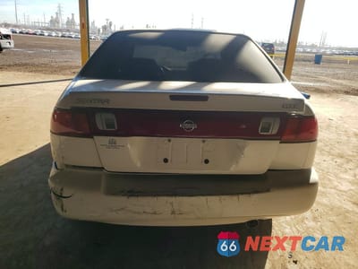 Zdjęcie 6 z 12 samochodu: 1999 NISSAN SENTRA XE VIN:1N4AB41D1XC719439 - miniatura