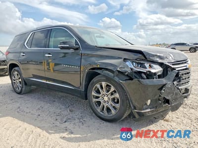Czwarte zdjęcie samochodu z boku: 2018 CHEVROLET TRAVERSE PREMIER VIN:1GNERKKW1JJ261147 - miniatura