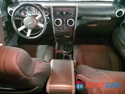 Zdjęcie 8 z 13 samochodu: 2010 JEEP WRANGLER UNLIMITED SAHARA VIN:1J4BA5H12AL122496 - miniatura