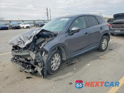 2014 MAZDA CX-5 TOURING JM3KE4CY9E0304672 - główne zdjęcie licytacji z USA - miniatura