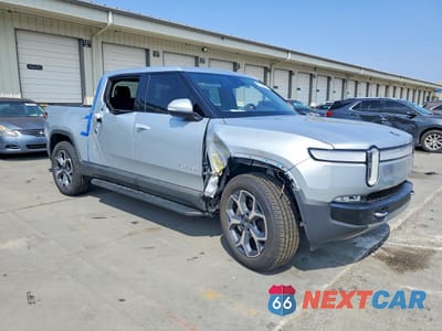 Czwarte zdjęcie samochodu z boku: 2023 RIVIAN R1T R1 VIN:7FCTGBAA9PN025045 - miniatura