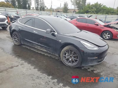 Czwarte zdjęcie samochodu z boku: 2020 TESLA MODEL 3 VIN:5YJ3E1EA2LF796598 - miniatura